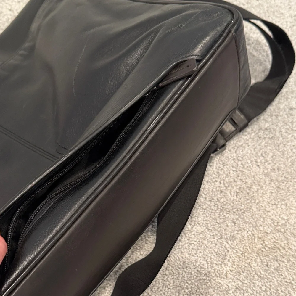 Tumi Black Leather Messenger Bag with Adjustable Strap